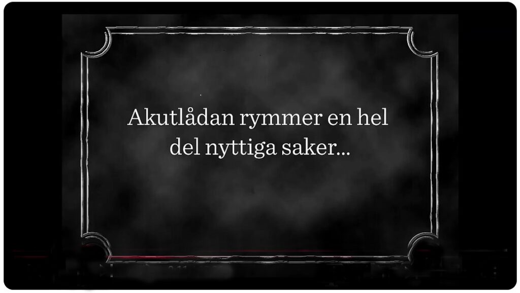 En svart skärmdump från en visning av film under webbinariet. I den svarta bilden står det: Akutlådan rymmer en hel del nyttiga saker...